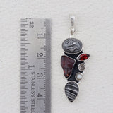 Fordite & Garnet Silver Pendant