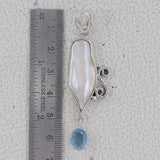 Fresh Water Pearl With Blue Topaz Pendant