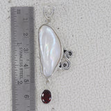 Fresh Water Pearl With Blue Topaz Pendant