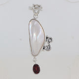 Fresh Water Pearl With Blue Topaz Pendant