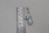 Blue Topaz & Rainbow Moon Stone Silver Pendant