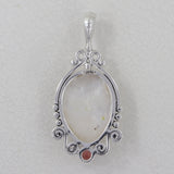 Face Carved Mother of Pearl With Garnet Silver Pendant