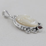 Face Carved Mother of Pearl With Garnet Silver Pendant