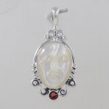 Face Carved Mother of Pearl With Garnet Silver Pendant