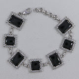 Black Onyx and White Topaz Silver Bracelets