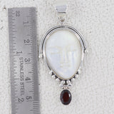 Moon Face With Garnet Pendant