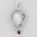 Moon Face With Garnet Pendant