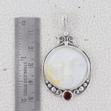 Moon Face With Garnet Silver Pendant